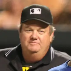 Nelson Cruz and Joe West.jpg