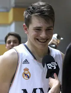 Luka Doncic, Jorge Parra, Domagoj Proleta y Pablo Poyatos (13919153208) (cropped).jpg